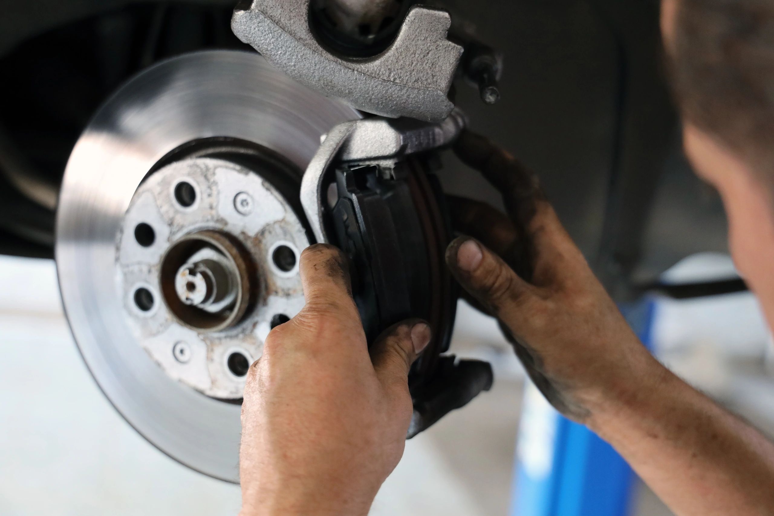 Brake pad replacement during auto service