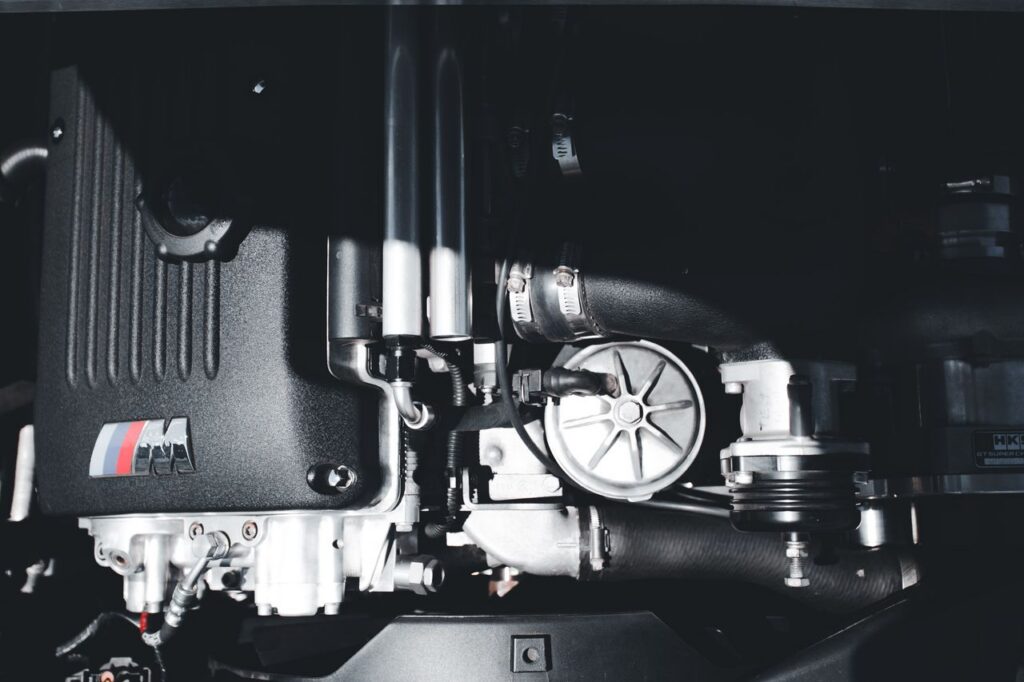 Close-up of a high-performance car engine showcasing intricate parts.